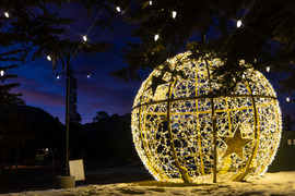 Giant ornament illuminated at night
