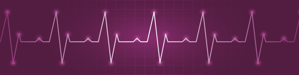 A heart monitor shows a steady rhythm
