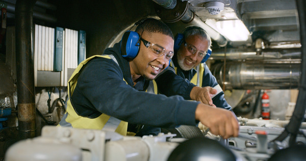 Young man in protective eyewear and high visibility vest