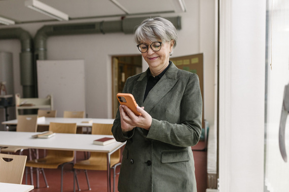 Person holding a mobile device