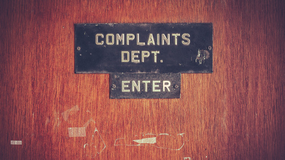 Complaints sign on door