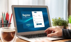 computer with a registration link on screen