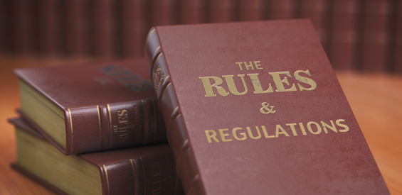 Rules an regulations books with official instructions and directions of organization or team