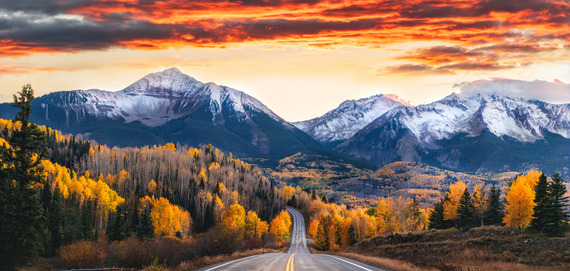 Stunning Sunset Sky Over Colorado Highway with San Juan Mountains in fall