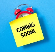 clock with coming soon on over it on a sticky note