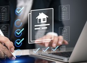 computer with digital image of a home checklist, contract