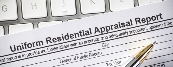 Universal Appraisal Form on a computer keyboard