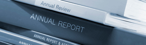 Stack of binders with Annual Report wording on them