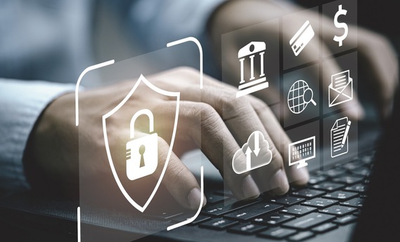 computer with security alert icons on image