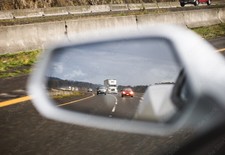 Defensive driving view in rear view mirror