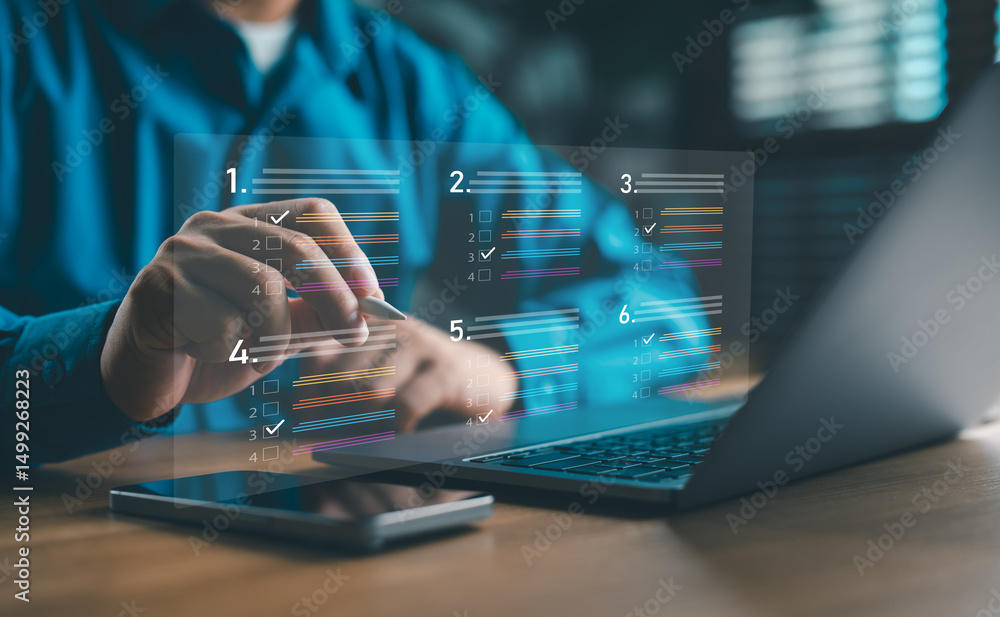 Person using a digital checklist interface on a laptop, with numbered tasks displayed.