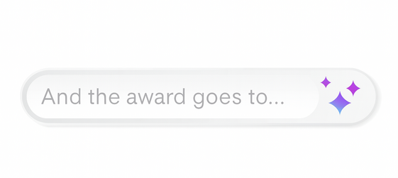 An AI search bar with the text 'And the award goes to...' on the left and three colorful sparkle icons on the right.