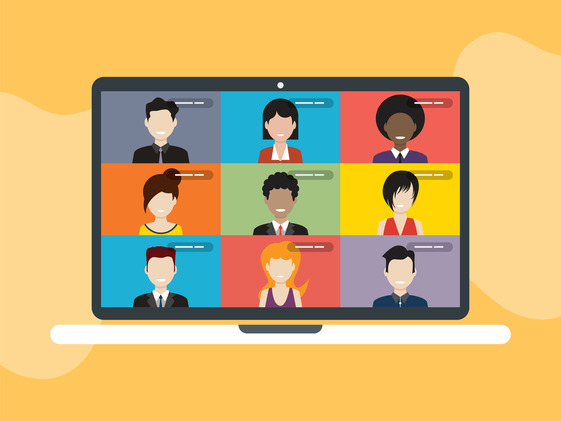 Laptop screen on a desk show attendees for an online zoom meeting