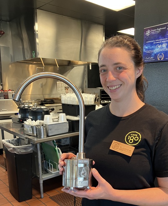 Cafe 180's Suzanne Holding the Boss Defrost