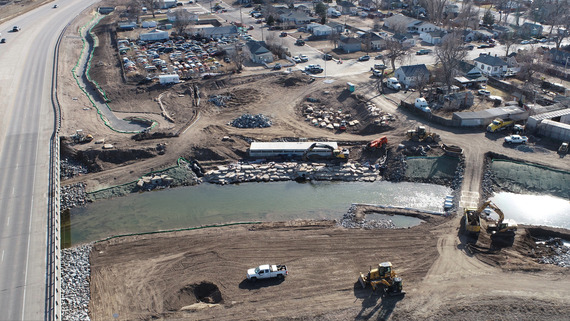 Aerial view of Greeley's 12th Street Outfall Project showing canal, box culvert and Poudre River