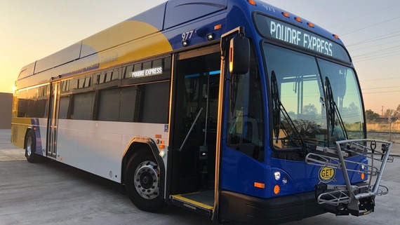 Poudre Express bus at sunrise