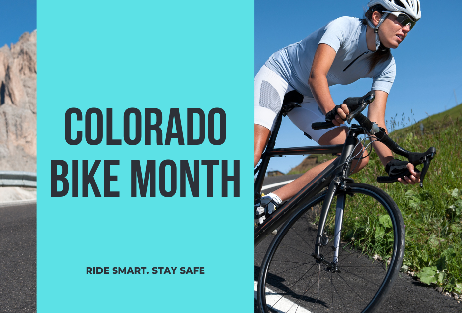 Colorado Bike Month.Ride Smart. Stay Safe. A bicyclist wears a helmet as they ride their bike down a hill on the road.