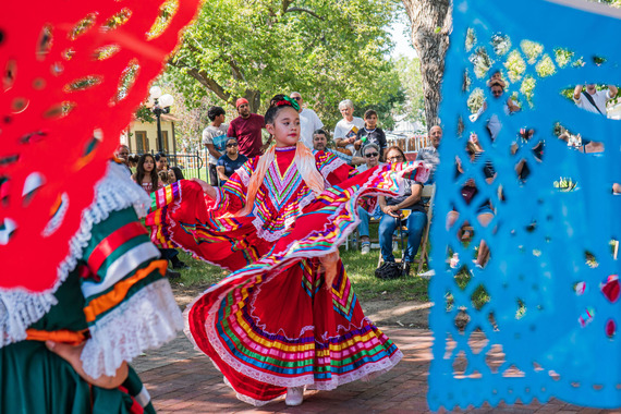 Mexican dancer in brightly colored dress