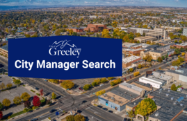Aerial view of downtown Greeley with blue box that says City Manager Search over the top.