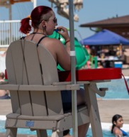 lifeguard supervises people swimming
