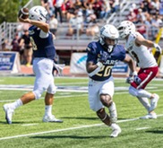college football players compete on the field