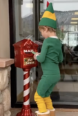 Little "elf" putting his santa letter in the North Pole Mailbox at the Gypsum Town Hall