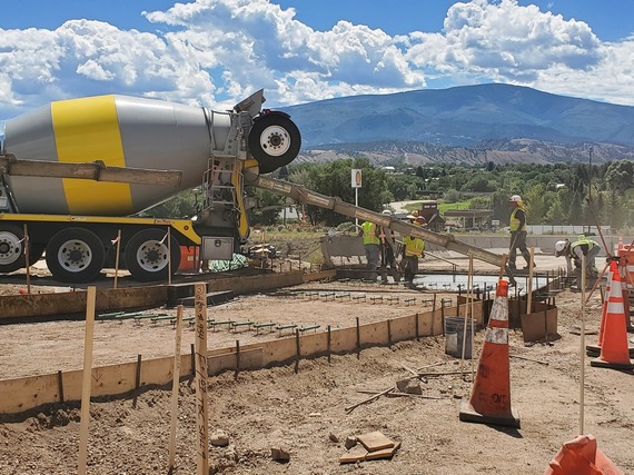 Crews concrete paving at the I-70 North Ramp Roundabout Project