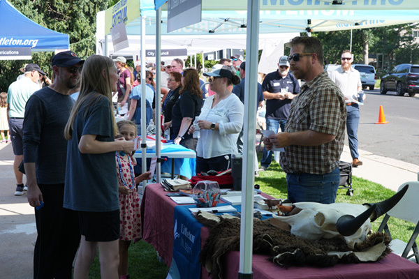 Residents and staff chatting at a Meet Greet & Eat event