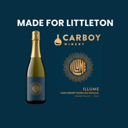 A bottle of Carboy Winery sparkling wine labeled "ILLUME" with gold and blue branding, next to a matching logo and text reading "Made for Littleton."