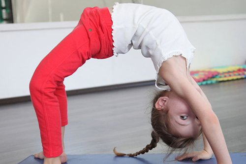 Little Girl doing yoga