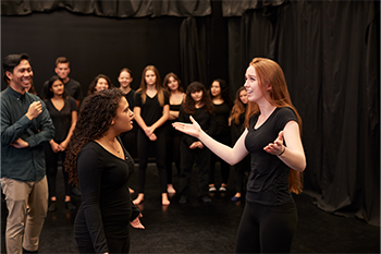 Teenagers performing Improv Acting