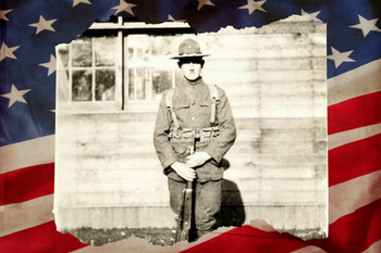 A soldier with an American flag behind him