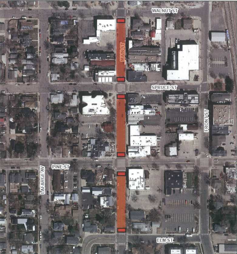 map of main street with red blocks from elm to pine, pine to spruce, and spruce to walnut