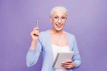senior woman taking resource notes