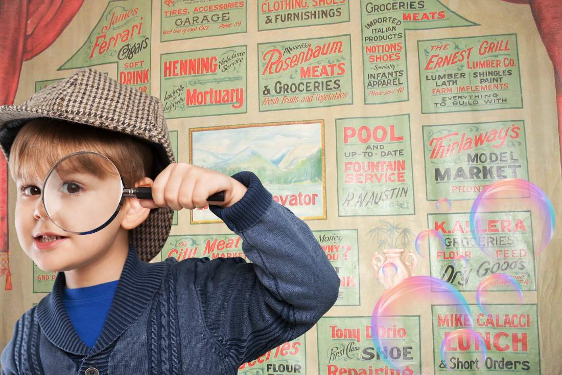 a small boy with a magnifying glass stands in front of the Rex Theatre curtain, a 1920s curtain with Louisville businesses advertised on it