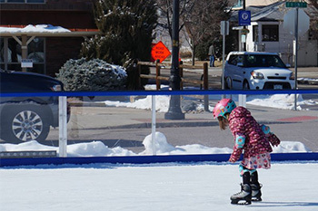 photo of little girl ice skating
