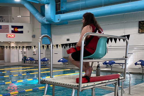 lifeguard sitting at his post 