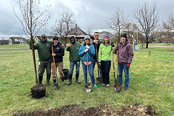 volunteers on Arbor Day planting trees