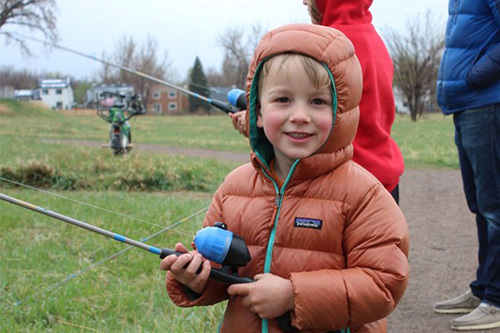 little kid at the annual fishing frenzy