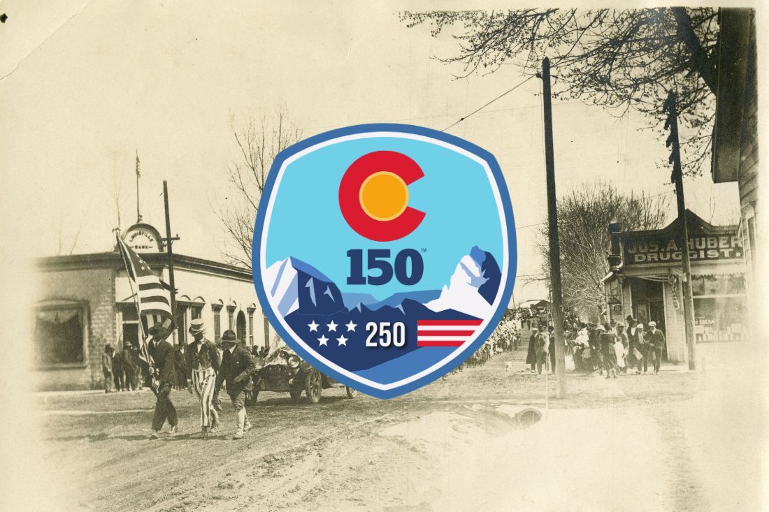 Colorado 150/250 commission logo in front of a black and white photo of people in a patriotic parade marching up Pine Street