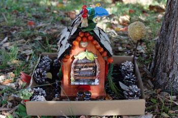 a fairy house by a tree