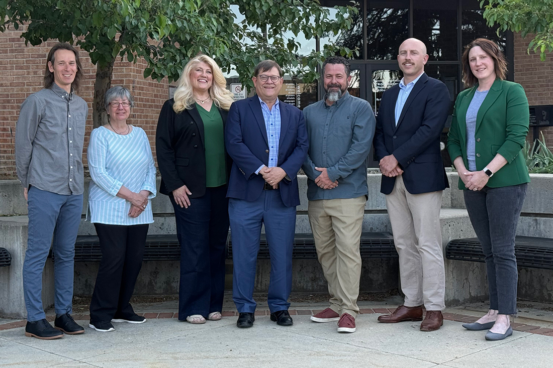 Members of Louisville's 2025 City Council standing in front of City Hall