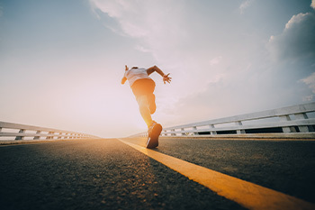 person running on a road