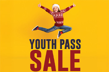 Little girl jumping for joy with the words "Youth Pass Sale"