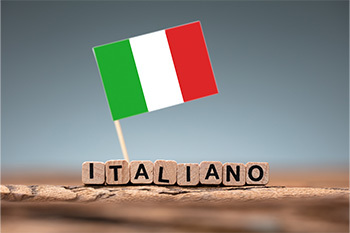 Italian flag and block letters spelling out Italiano
