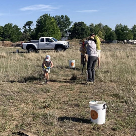 Volunteers pulling weeds