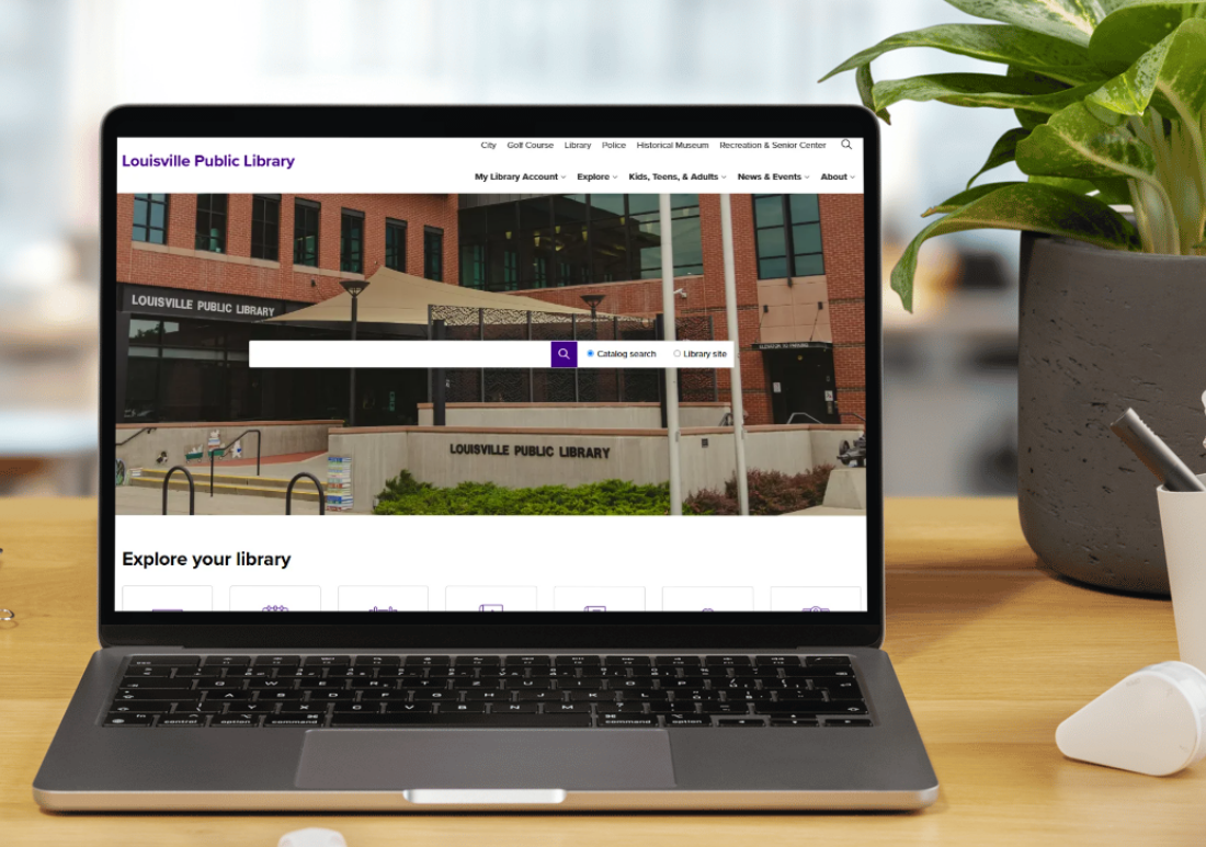 image of new library website displayed on laptop screen