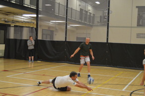 Men playing volleyball