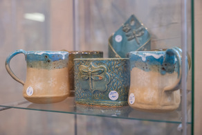 blue and white mugs made by local artist angela page