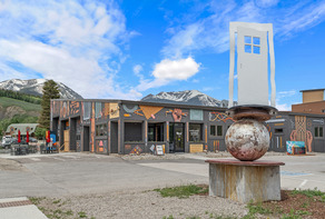 Ed Haddaway Door Sculpture in front of Art Spot